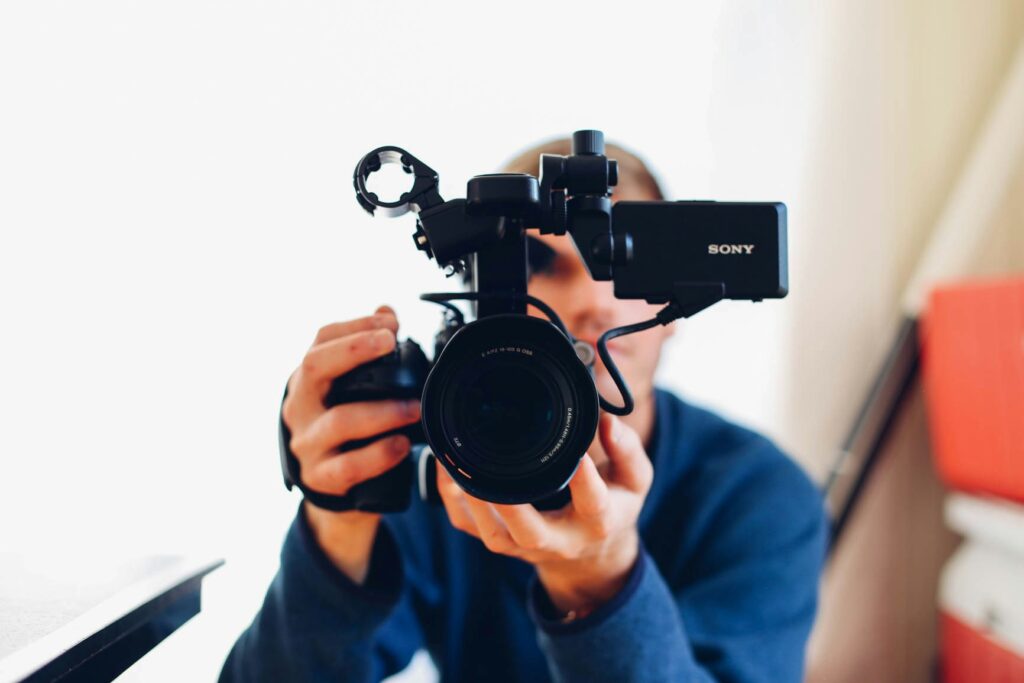 Man holding a video camera