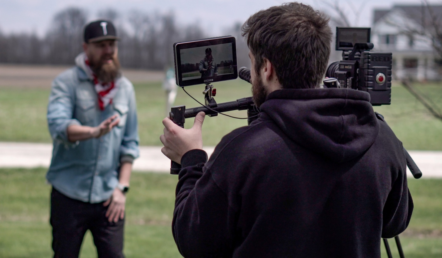 A cameraman shooting a video commercial