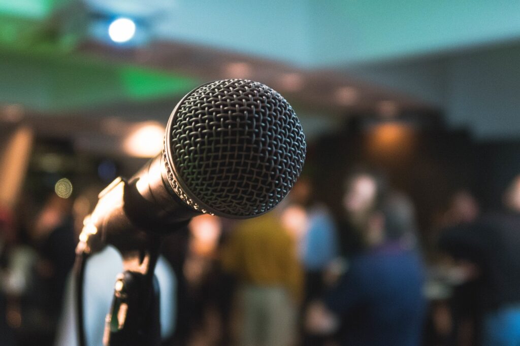 Microphone sits on a stand with nobody near it