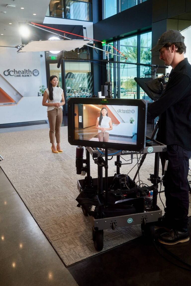 Corporate interview video setup with lighting and camera equipment for a professional business video production