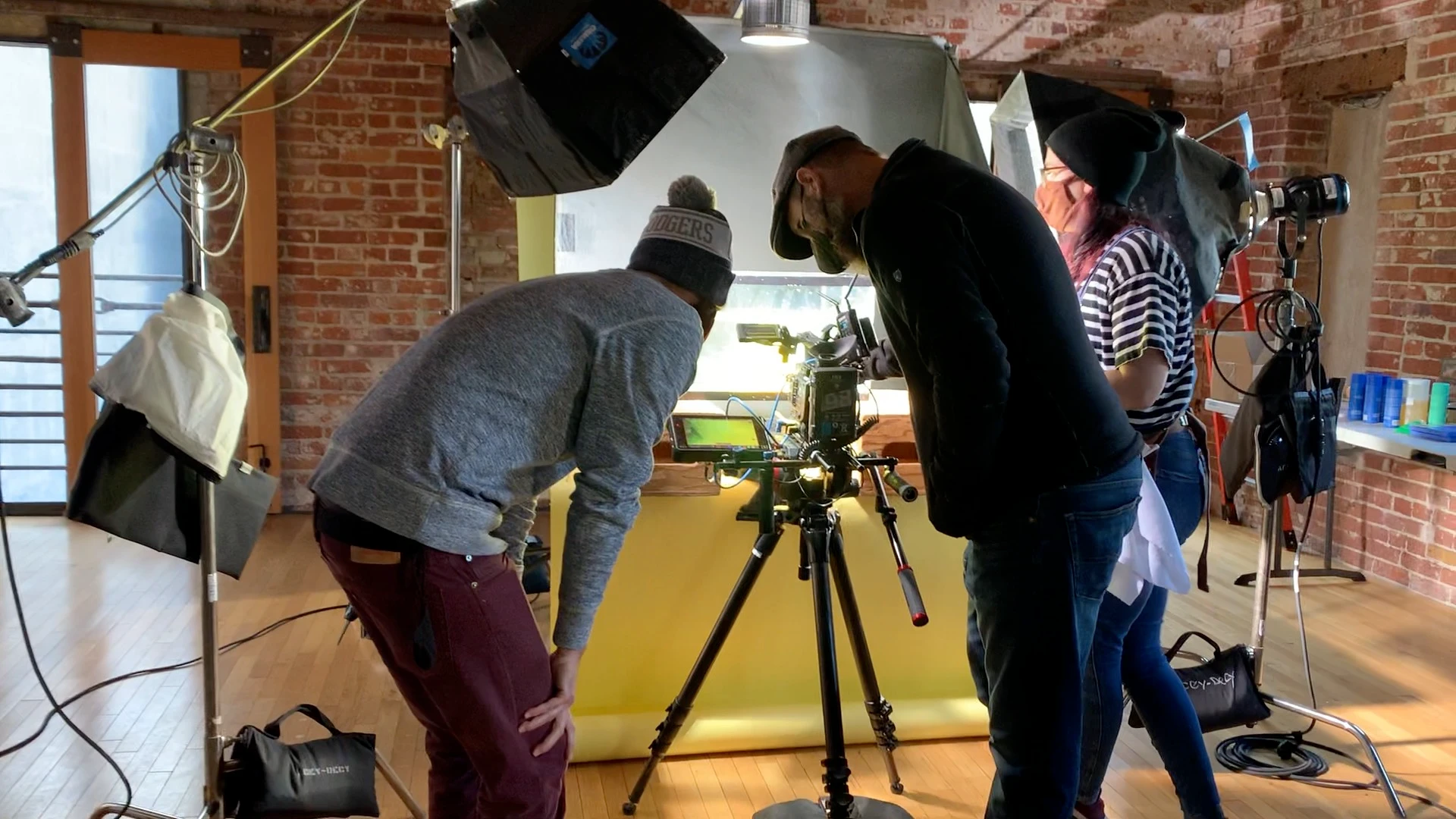 Cameraman and Director setting up the scene