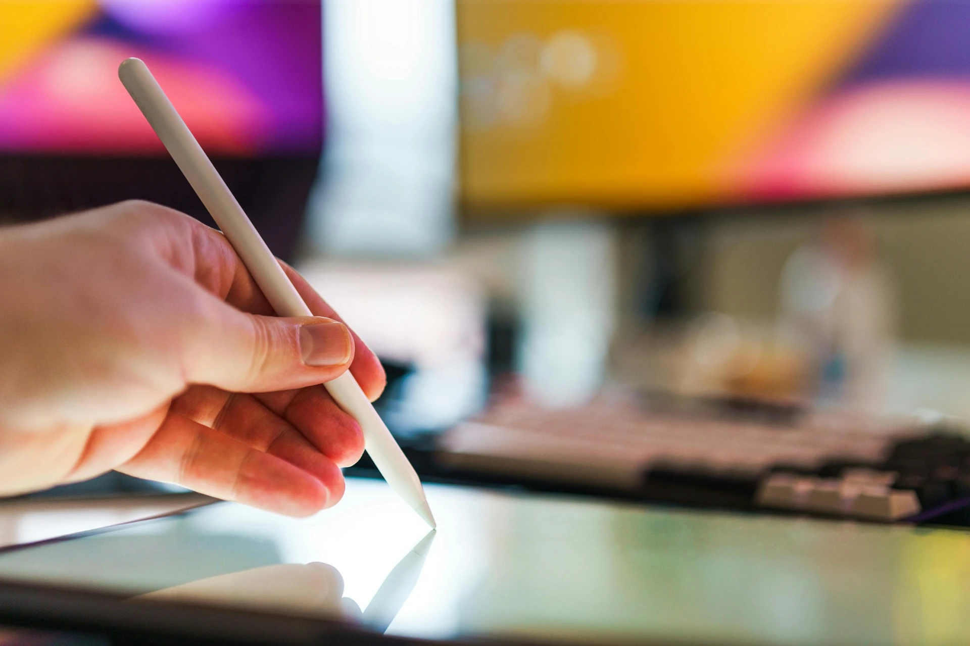Women working on Tablet with touch pen